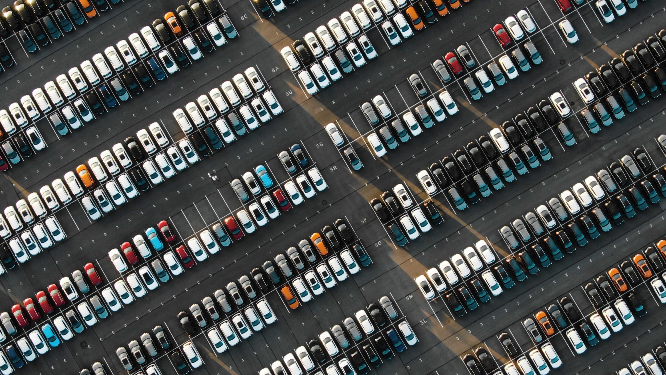 Aerial,View,Of,The,Parked,New,Cars,At,The,Automotive
